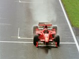1998 Ferrari F300 - $Schumacher hurtles down the main straight at Silverstone in chassis 187 where he finished in 1st place.