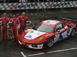 Joe Foster, Don Kitch Jr., and Patrick Dempsey pose with the F430 GT2 during the driver’s parade prior to the 2009 24 Hours of Le Mans.