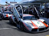 The two Krohn-Barbour Racing Lamborghini Murciélago R-GTs lined up in the pit lane at the Grand Prix of Sonoma in the American Le Mans Series. Chassis 1057, car number “6”, can be seen behind its sister car.