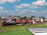 Chassis 0497 SA following the barn collapse as a result of Hurricane Charley, 2004.