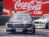 Schneider rounds a corner at the ADAC Avus on 8 May 1992 in the 190 E 2.5-16 Evolution II ahead of a BMW M3 Sport Evolution. He would set the fastest lap and take victory in Race 2 that weekend.