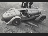 Seen from above the pit lane at the 1938 24 Hours of Le Mans, the Delahaye would be driven to a 2nd-place finish.