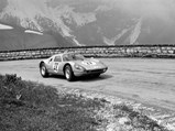 Udo Schütz driving his Porsche 904 at the 1965 Alpen-Bergpreis Rossfeld with the stunning mountainside behind him. He finished 5th in the GT class.
