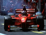 1998 Ferrari F300 - $Michael Schumacher races off following a pit stop in chassis 187 at the 1998 French Grand Prix.