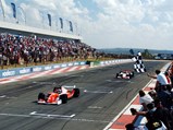 Nigel Mansell (GBR) takes the chequered flag and wins the race ahead of second placed Emerson Fittipaldi (BRA).
Grand Prix Masters, Race Day, Kyalami, South Africa, 13 November 2005.