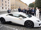 His Holiness Pope Francis signs the Lamborghini Huracán at a ceremony in Vatican City in November of 2017.