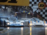 Chassis 956-110 dominates in the rain at the Brands Hatch 1000 KM in 1983.