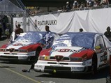 1996 Alfa Romeo 155 V6 TI ITC  - $Nicola Larini (5) and Alessandro Nannini (6) relax with their Alfa Romeo 155 V6 Ti's before the 1996
Helsinki race.
