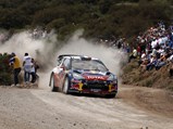 Fans line the race route at the 2012 Acropolis Rally, which was won by Sébastien Loeb.