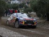 The Citroën plugs through the mud at the 2012 Rally Catalunya, which was won by Sébastien Loeb.