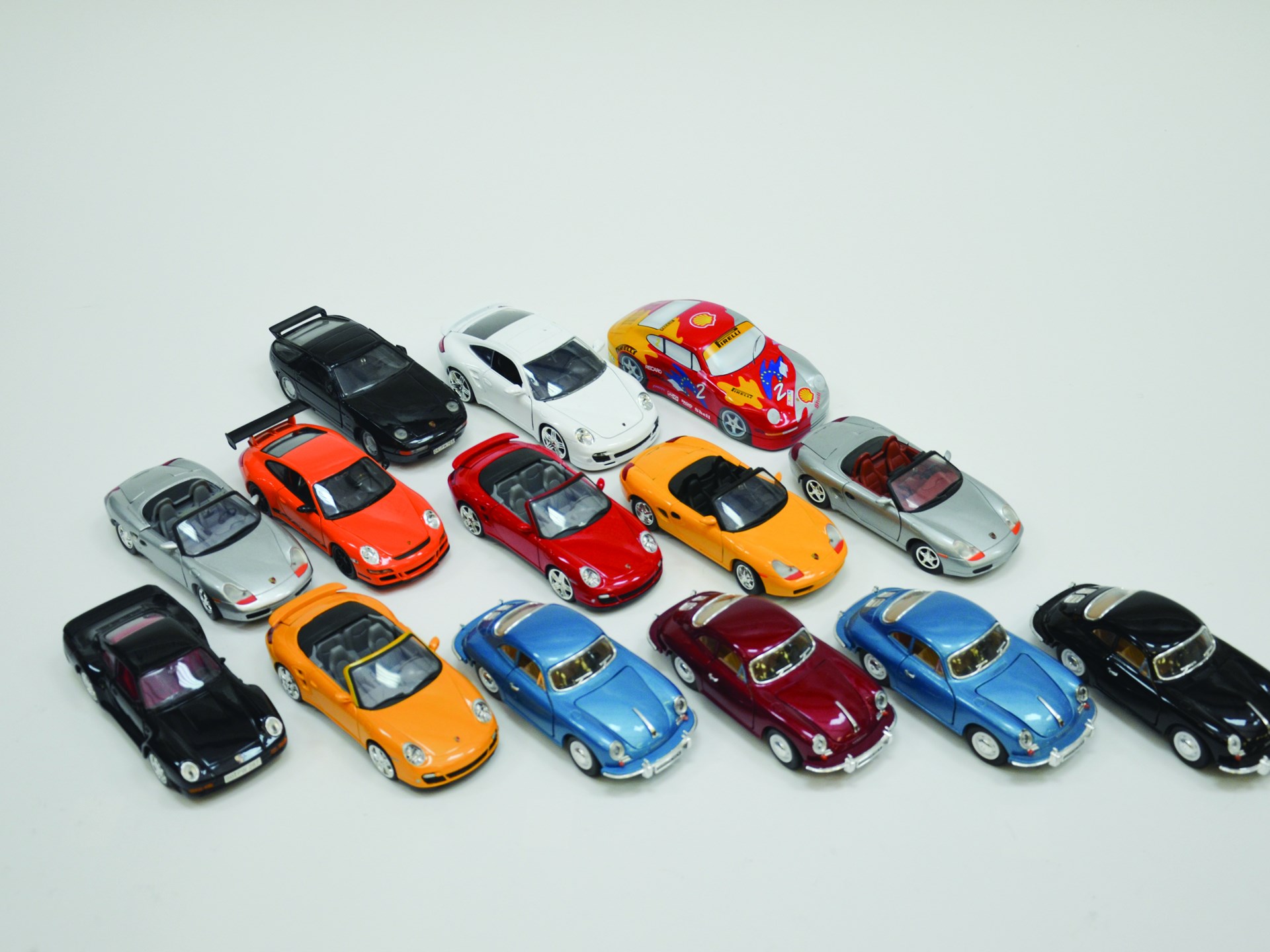 A Group Of 14 Diecast Porsche Toy Cars 1 24 Scale Mostly Various Years 