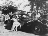 Mme Monique Violland with the Bugatti Type 57S Atalante.