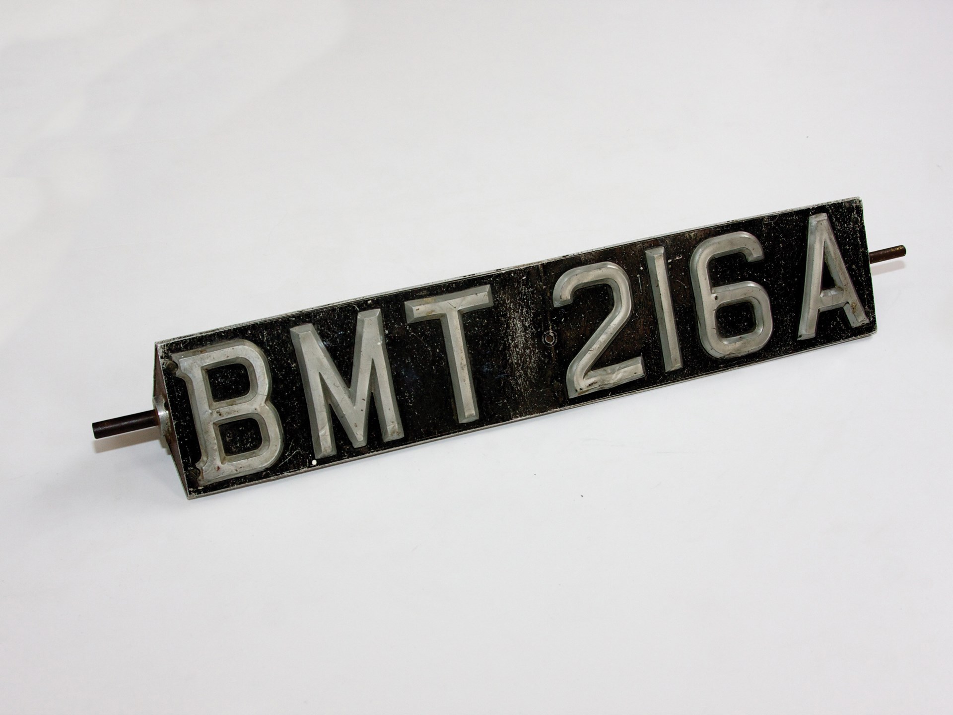 James Bond, Aston Martin Revolving Number Plate ThreeSided Plinth Automobiles of London 2010