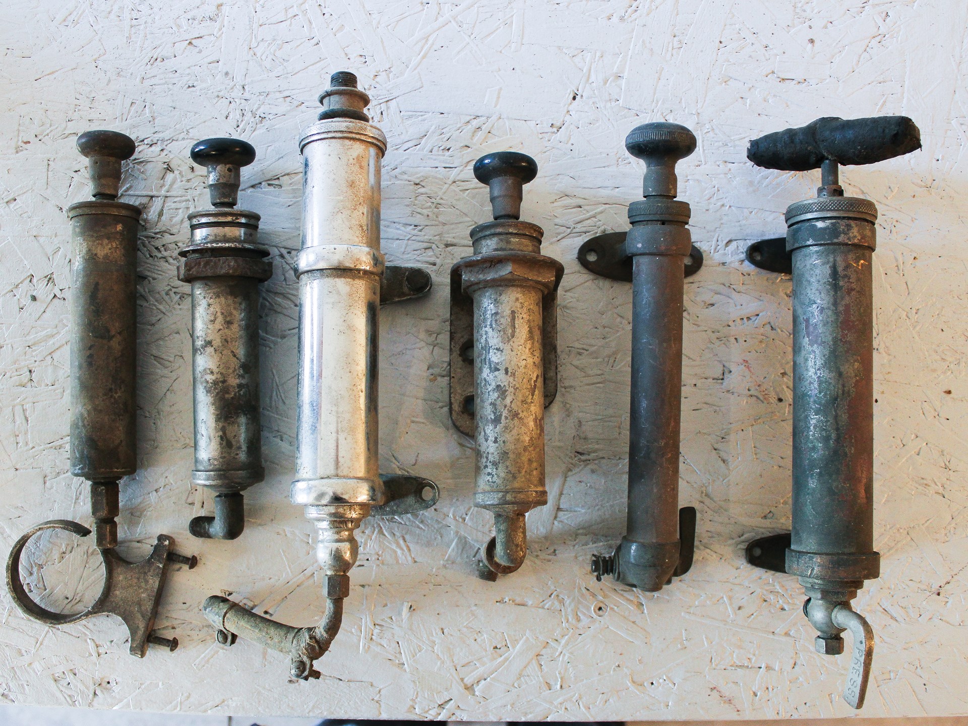 Antique Fuel Pressure Air Pumps, Six Assorted Pieces | Auburn Spring