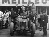 Gaston Serraud and his teammates celebrate finishing 2nd at the 1938 24 Hours of Le Mans.