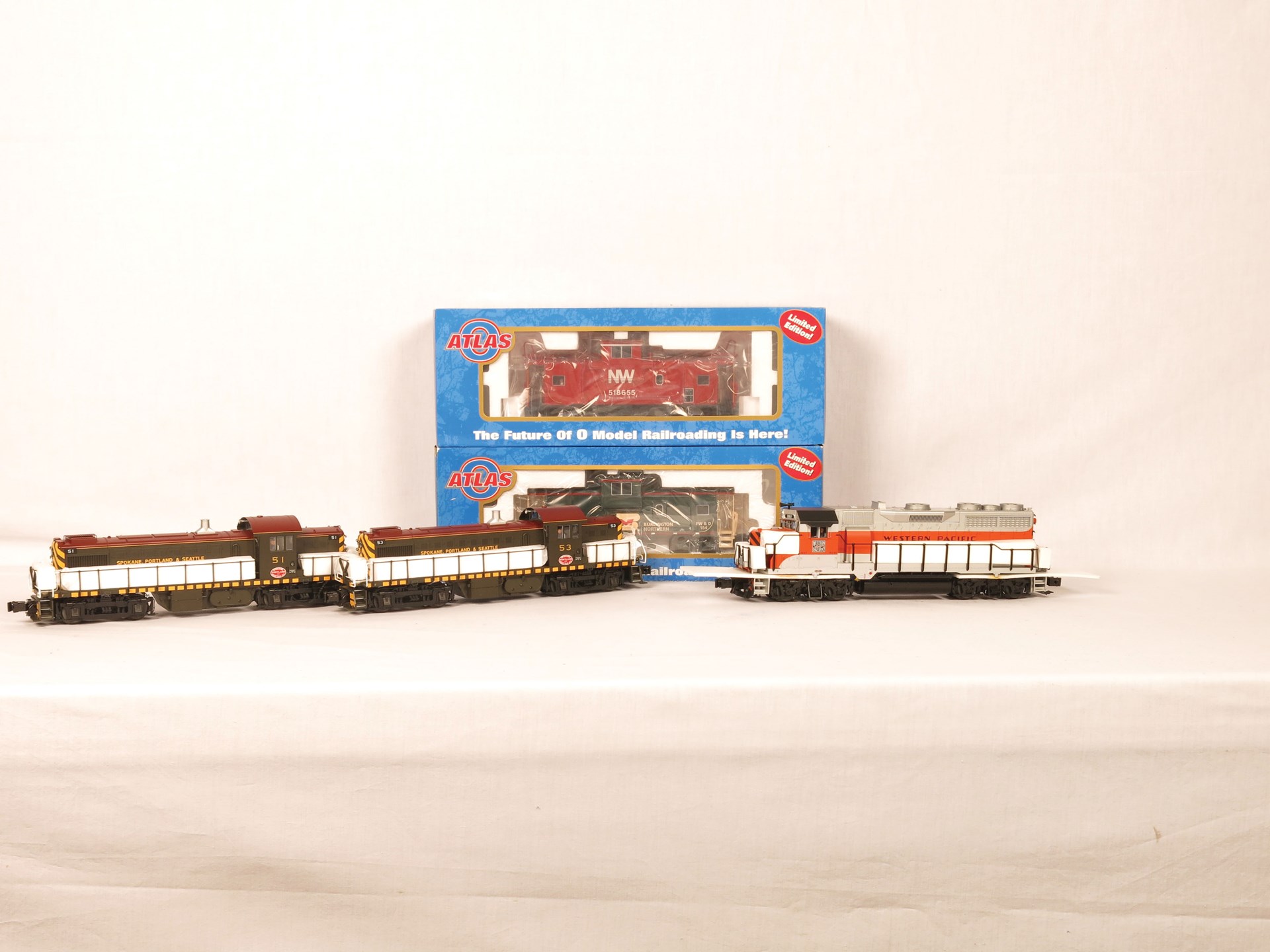 Three Atlas O Gauge Diesel Locomotives with Two Cabooses - 3 Rail ...