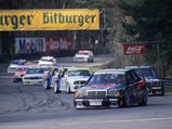 Bernd Schneider’s 190 E 2.5-16 Evolution II is captured at the forefront of the grid at Zolder on 5 April 1992, contesting the DTM series.