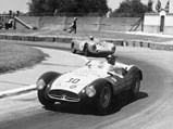 The Maserati in the colors of "Equipo Presidente Peron" en route to 3rd overall at the 1955 Buenos Aires 1000 KM.