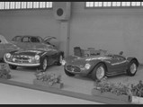 In a display that encompassed both the grand touring and competition sensibilities that Modena was capable of embracing, chassis number 2101 (left) is exhibited on Maserati’s stand at the 1955 Geneva Salon, sitting beside an A6GCS racing barchetta.  This early photo notably showcases the A6G/54’s unusual original grille work.