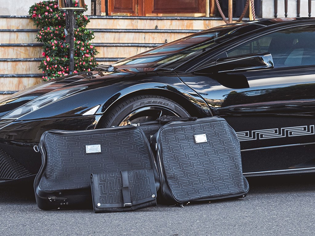 2008 Lamborghini Murciélago LP6404 Coupé Versace EGear and matching luggage set offered at RM Sothebys Paris Auction 2021