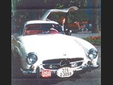 Swiss industrialist Rene Wasserman, the first owner of this extraordinary alloy Gullwing, is pictured here with the car when it was virtually new, appropriately finished in white over red.