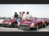 1955 Ferrari 410 Sport Spider by Scaglietti - $Left to right: Alfonso de Portago, Joe Landaker, Masten Gregory, and friends, with John Edgar's Ferraris #88 857 Sport and #98 410 Sport, Nassau Speed Week paddock, December 1956.