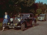 The consigning owner’s mother is pictured with the Mercedes-Benz in 1958.