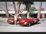 Newly crowned Miss Palm Springs, Stephanie Bruton, alongside John Edgar’s Ferraris, with Jack McAfee in the 375 Plus and Carroll Shelby in the 410 Sport at Palm Springs, November 1956. 
